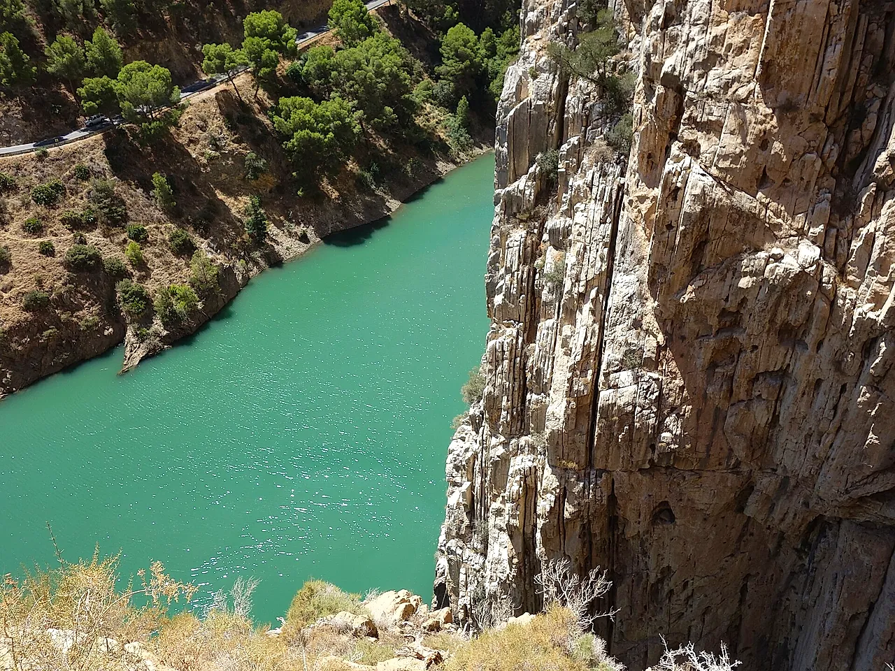 Turquoise water of the Gaitanes gorge between steep rock walls
